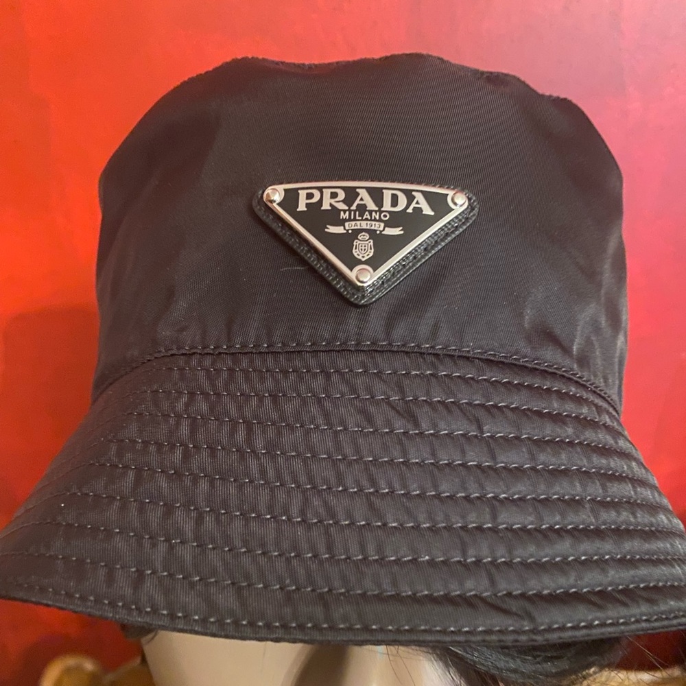 Prada bucket hat.